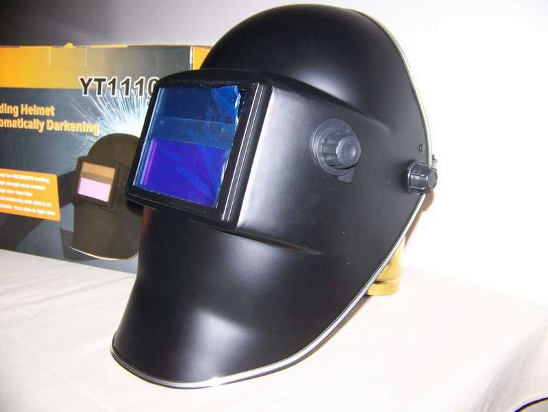 Solar powered auto darkening helmet .  Black