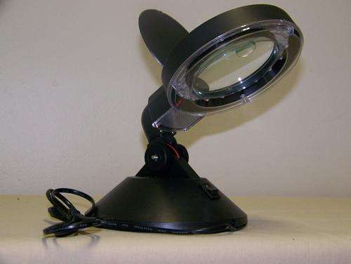 Desk top magnifying glass.