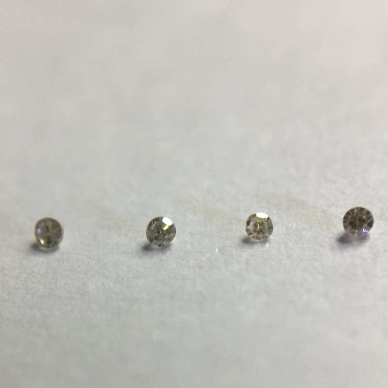 0.02 ctw 4 x VVS - VS champagne single cut diamonds