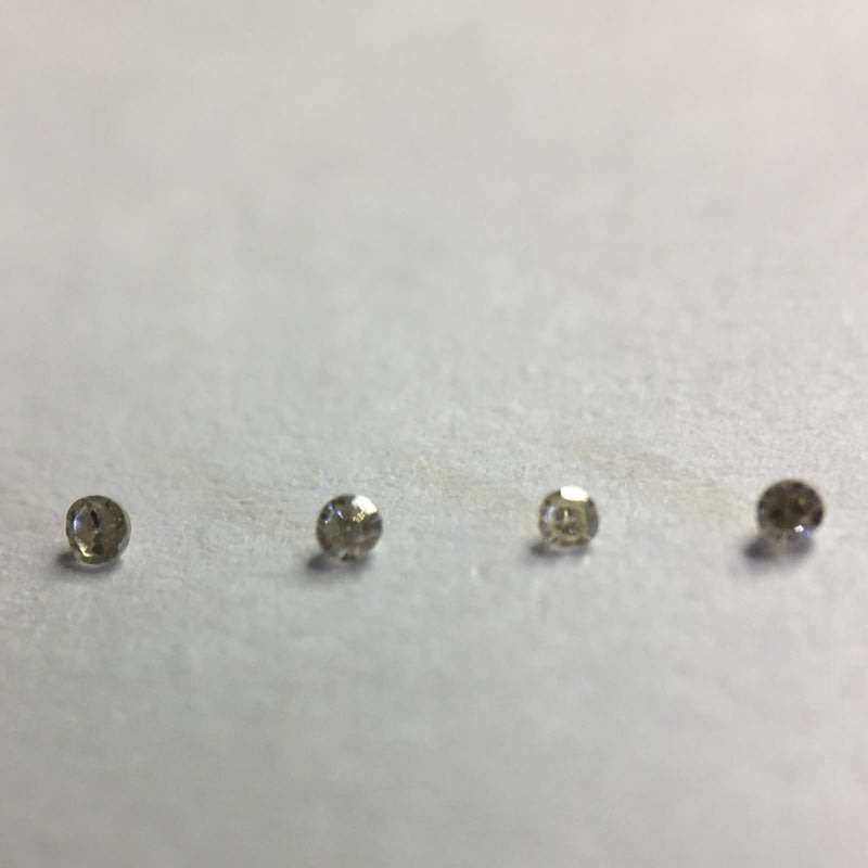 0.02 ctw 4 x VVS - VS champagne single cut diamonds