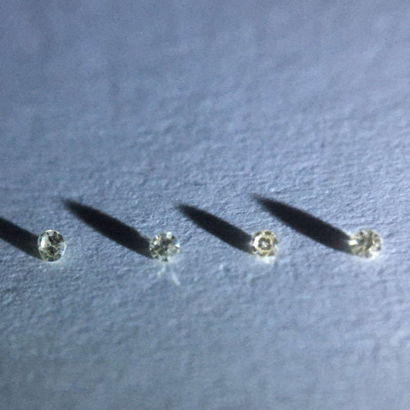 0.02 ctw 4 x VVS - VS champagne single cut diamonds