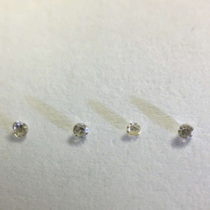 0.02 ctw 4 x VVS - VS champagne single cut diamonds