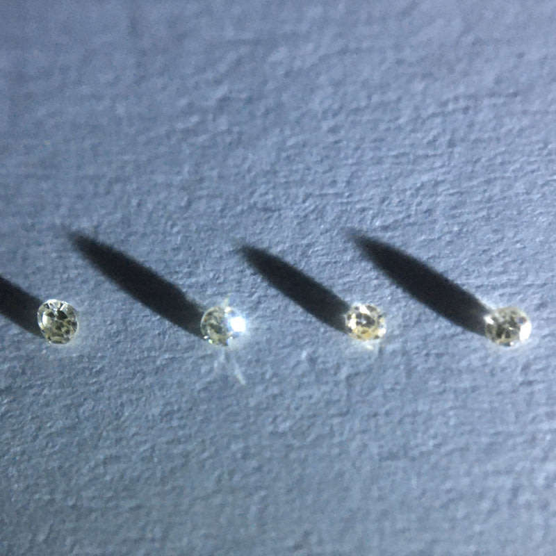 0.02 ctw 4 x VVS - VS champagne single cut diamonds