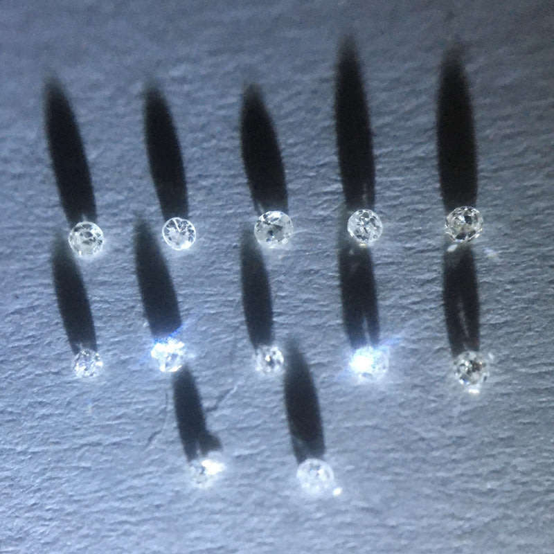 0.05 ctw 12 x F/G/H VVS - VS single cut diamonds