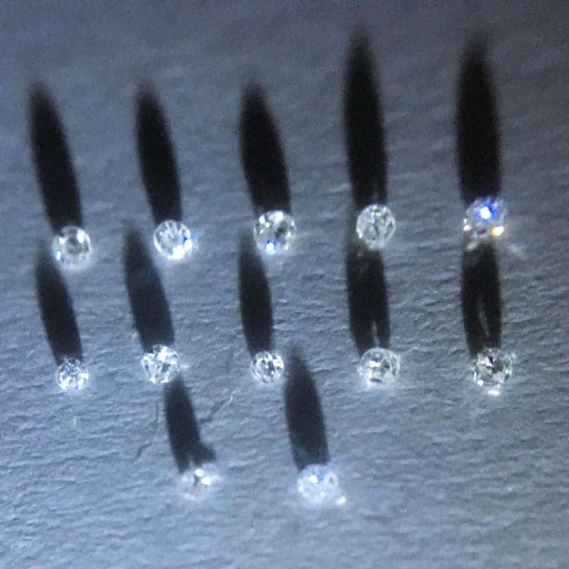 0.05 ctw 12 x F/G/H VVS - VS single cut diamonds