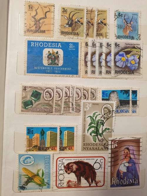 Rhodesias (used) in small worn album - WONDERFUL SELECTION - good value and some cool postmarks