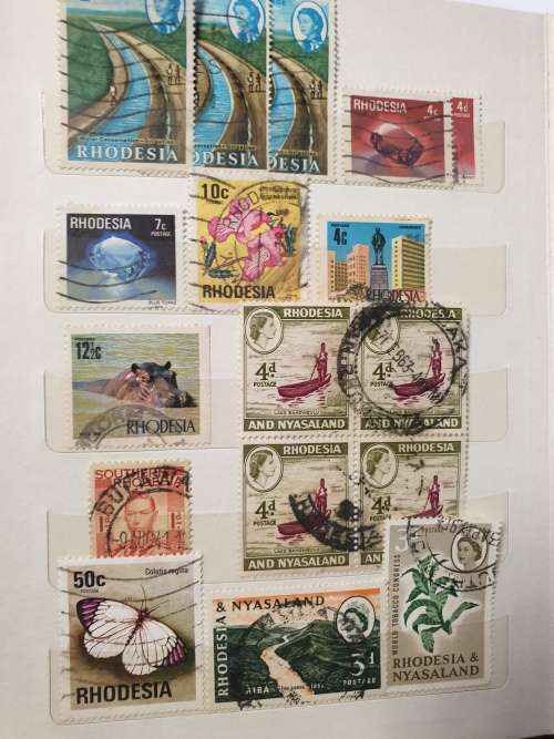 Rhodesias (used) in small worn album - WONDERFUL SELECTION - good value and some cool postmarks