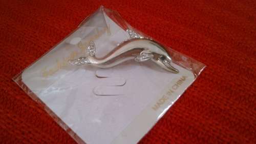 Dolphin brooch
