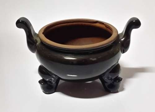 A VINTAGE  POT PLANT  VASE HOLDER