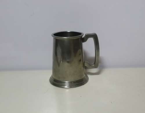 A PEWTER  I PINT  SHEFFIELD TANKARD GLASS BOTTOM