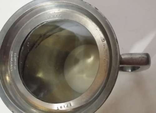 A PEWTER  I PINT  SHEFFIELD TANKARD GLASS BOTTOM