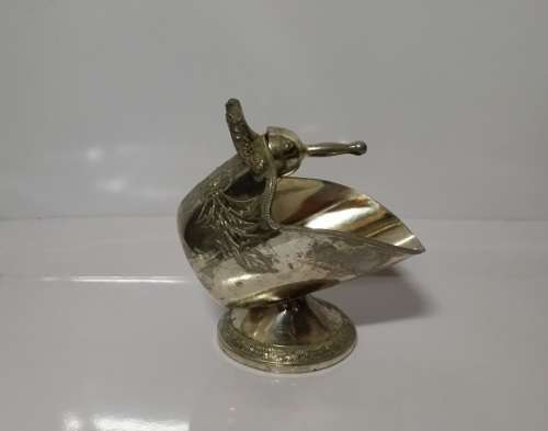 A VINTAGE EMBOSSED  BOWL WITH SCOOP