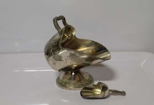 A VINTAGE EMBOSSED  BOWL WITH SCOOP