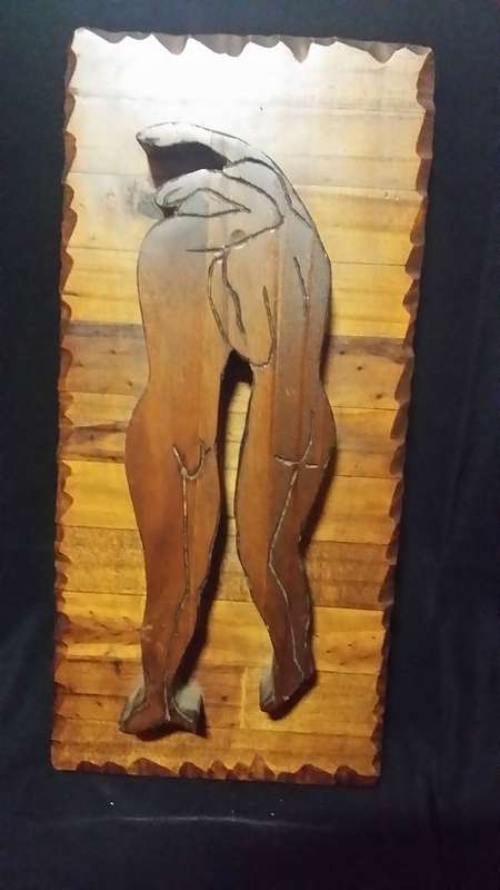 A SOLID WOOD CARVED FIGURINES PLAQUE