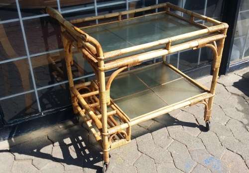 A CANE DRINKS TROLLEY ON CASTOR /  WHEELS