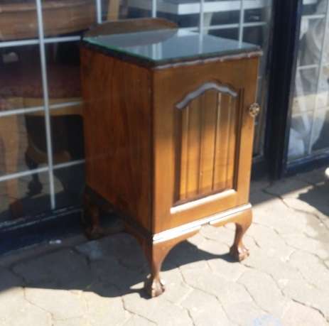 A IMBUIA BALL AND CLAW BEDSIDE  CUPBOARD / BUYER MUST COLLECT IN EDENVALE JHB