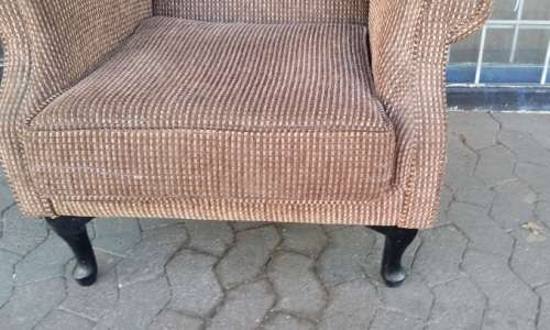 BROWN WING BACK CHAIR /  BUYER MUST COLLECT EDENVALE JHB
