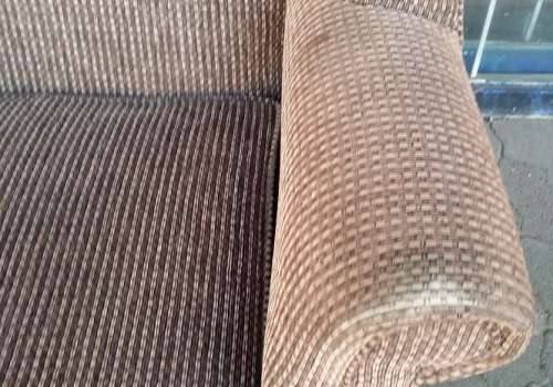 BROWN WING BACK CHAIR /  BUYER MUST COLLECT EDENVALE JHB