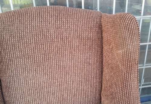 BROWN WING BACK CHAIR /  BUYER MUST COLLECT EDENVALE JHB