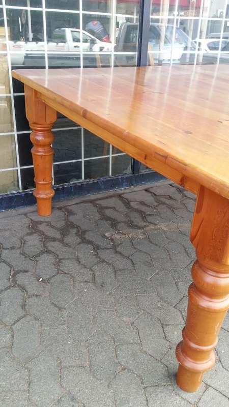 8 SEATER  OREGON SQUARE DINING   TABLE THICK TURNED LEGS / BUYER MUST COLLECT IN EDENVALE JHB