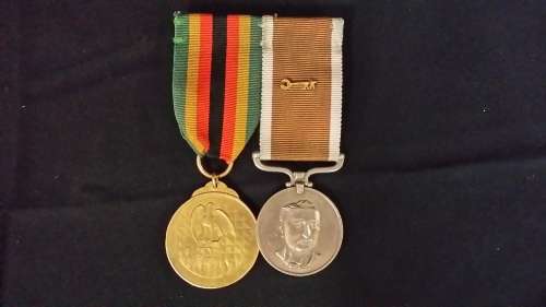 ONE SERVICE MEDAL  562  AND ONE 1980 ZIMBABWE INDEPENDENCE  15 928