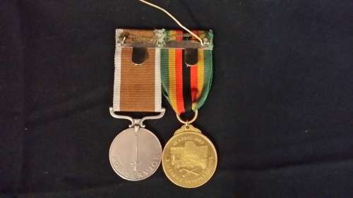 ONE SERVICE MEDAL  562  AND ONE 1980 ZIMBABWE INDEPENDENCE  15 928