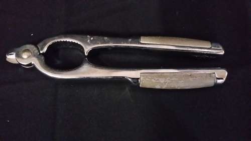 VINTAGE  MARTINI NUTCRACKER AND  CUTTER