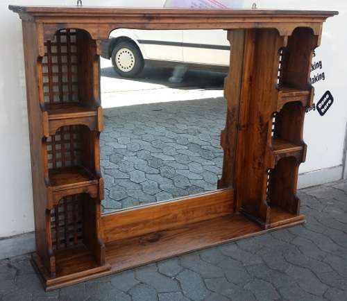 A SOLID WOODEN  MIRROR AND SHELVE UNIT can be wall mounted or on  /  BUYER MUST COLLECT EDENVALE JHB