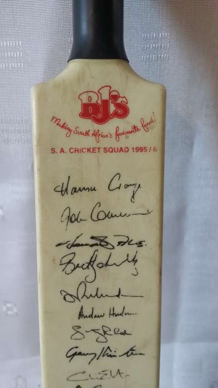 S. A CRICKET SQUAD 1995/6 SIGNED SMALL  BAT BY HANSIE CRONJE AND TEAM