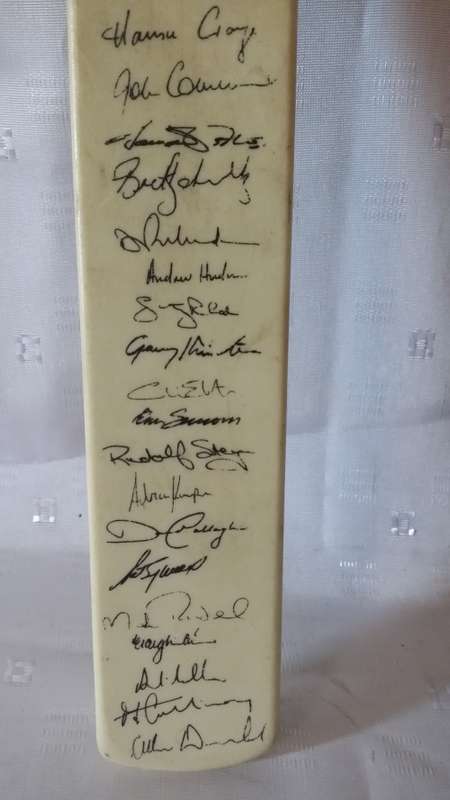 S. A CRICKET SQUAD 1995/6 SIGNED SMALL  BAT BY HANSIE CRONJE AND TEAM