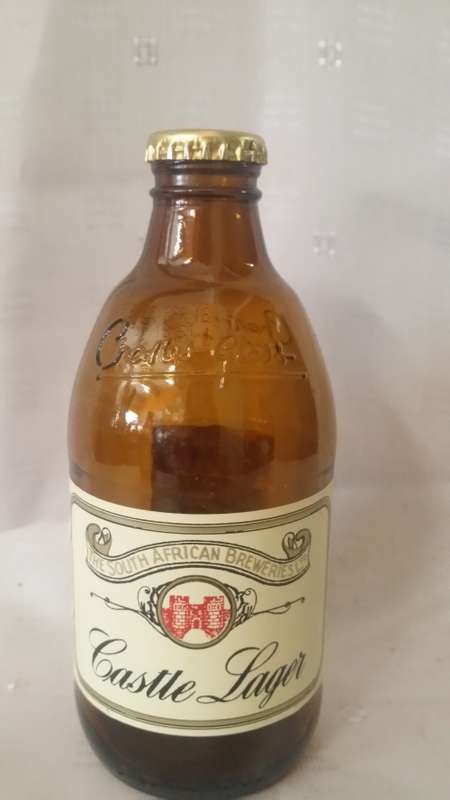 EMPTY 340ml  CASTLE LAGER BEER BOTTLE