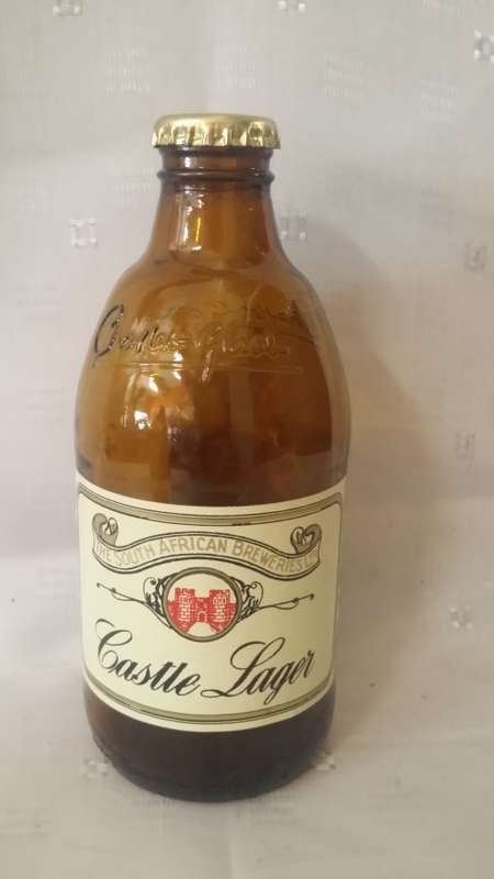EMPTY 340ml  CASTLE LAGER BEER BOTTLE