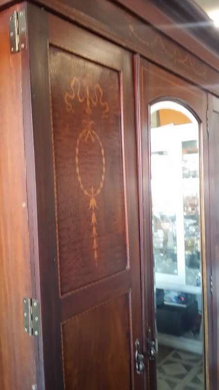 ANTIQUE WARDROBE  WITH  LARGE DRAWER AND BEVELLED MIRROR   / BUYER MUST COLLECT IN EDENVALE JHB