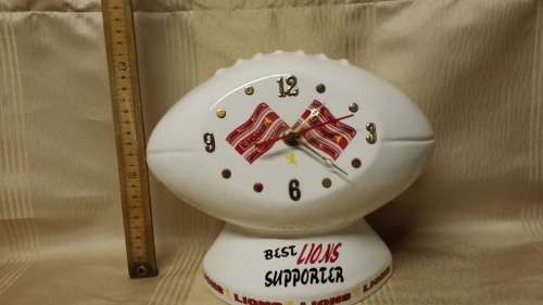 LIONS RUGBAL BALL SHAPED QUARTZ CLOCK