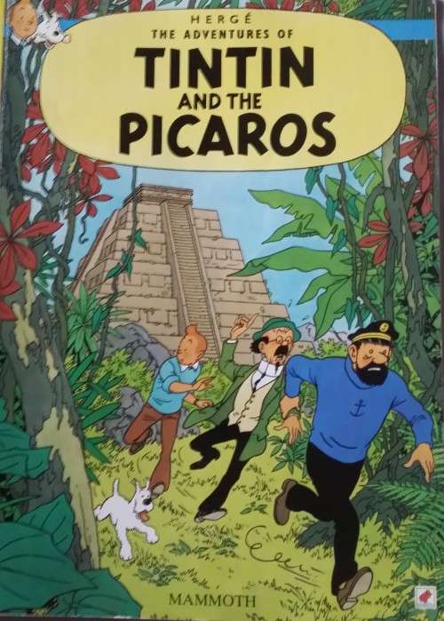 BOOK :  THE ADVENTURES OF TINTIN -  TINTIN AND THE PICAROS - PAPERBACK
