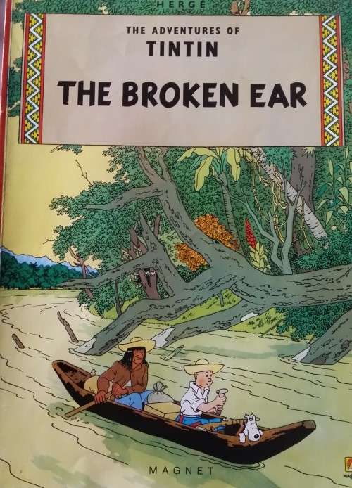 BOOK :  THE ADVENTURES OF TINTIN -  THE BROKEN EAR - PAPERBACK
