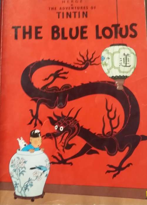BOOK :  THE ADVENTURES OF TINTIN -  THE BLUE LOTUS  - PAPERBACK