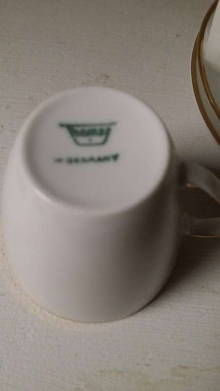 Set of  white and gold - four demitasse cups and four saucers Thomas Germany