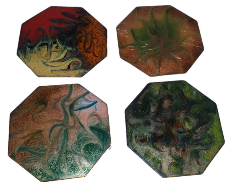 Four Enamelled  Coasters