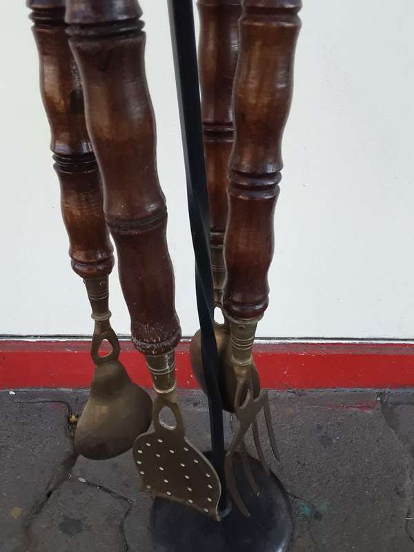 Stand with four Wood and Brass Utensils