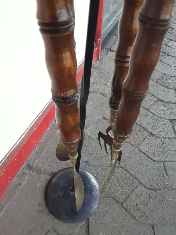 Stand with four Wood and Brass Utensils