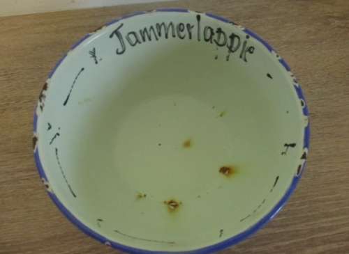 Two vintage enamel dishes.