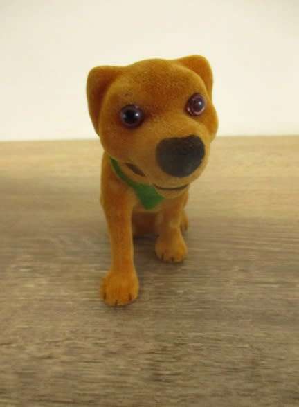 An old nodding dog. Excellent condition.