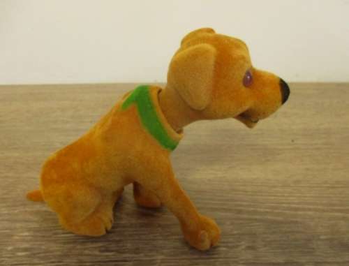 An old nodding dog. Excellent condition.