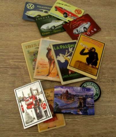 A large collection of 12 old fridge magnets. Different sizes. Different figures.