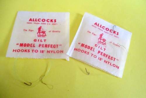 A lot vintage fishing tackle stuff in a rare very old "Players Navy Cut"  cigarette tin.
