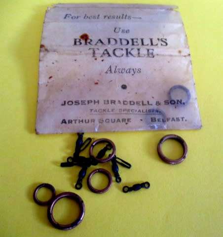A lot vintage fishing tackle stuff in a rare very old "Players Navy Cut"  cigarette tin.