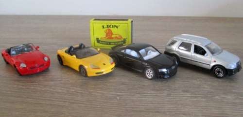 A Collection of 4x Die Cast Welly Automobiles
