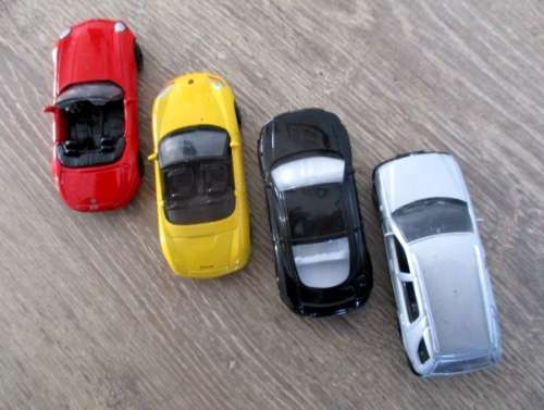 A Collection of 4x Die Cast Welly Automobiles