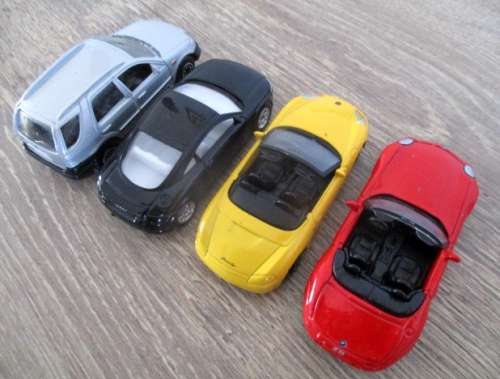 A Collection of 4x Die Cast Welly Automobiles